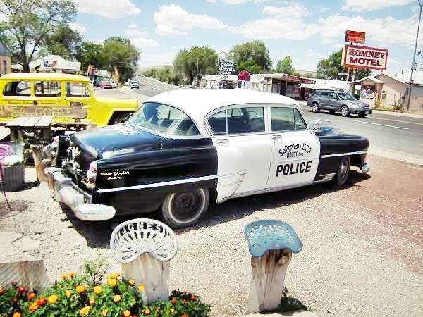 Vintage 1950s police patrol parked on Main Street in Seligman