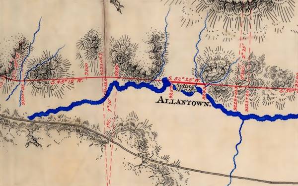 vintage color map from 1881, with terrain, Puerco River marked in blue running across it, the railroad as a red line above it, a site called ALLANTOWN, and a road on the south of the river