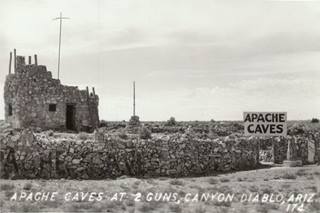 Apache Death Caves 1940s Two Guns AZ black and white vintage photo sign of APACHE CAVES and stone wall surrounding towerlike stone building
