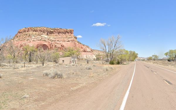 color view, ochre cliffs, trees, and old Route 66
