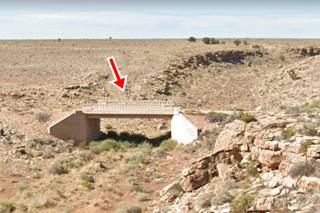 Bridge on the old US66 alignment near Barringer Crater and Meteor City concrete bridge across gully seen from the Freeway