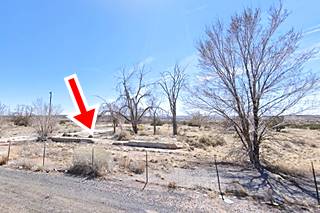 Cedar Point ruins in 2022 Sanders US66 foundations and rubble among the trees next to the highway