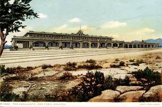 Escalante hotel postcard Ash Fork AZ color early 1900s postcard large two story hotel with arches facing railroad tracks