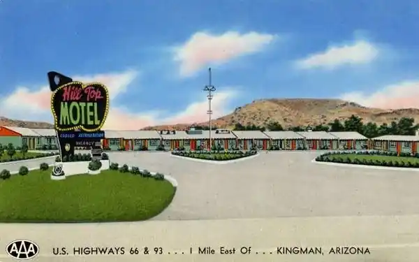 1940s postcard, neon sign, motel and hill behind