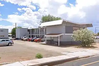 2-story apartments butterfly-shaped roof