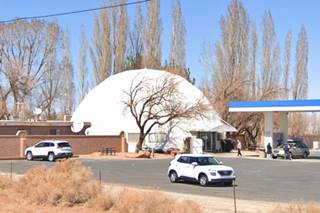 Meteor Crater RV Camp 2022 dome, cars, treees and gas station canopy