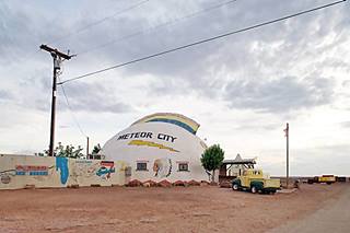 Meteor City geodesic dome, yellow truck, map painted on a wall
