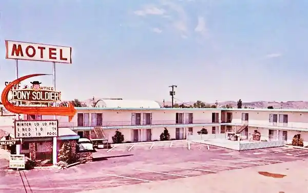 1960s postcard Pony Soldier Motel 1960s postcard motel, car, neon sign, pool