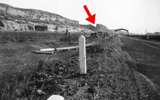 1938 Port of Entry at Lupton AZ black and white picture looking east along Route 66, left side: cliffs, shack, arch over highway