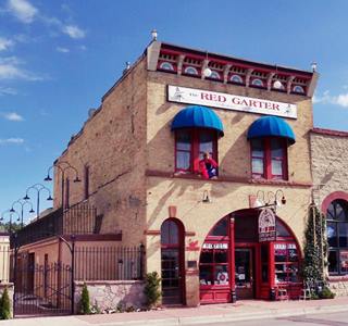 brick building, two stories facing Route 66