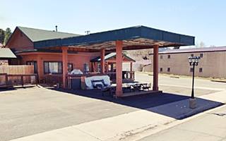 former gas station, made to look like a log cabin