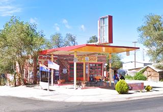 former Shell gas station Seligman, Route 66 1950s brick shell station butterfly detached canopy