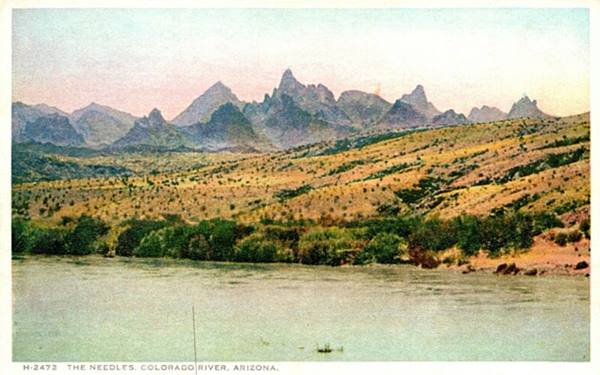 vintage color postcard with jagged mountains with pinnacles rising above the Colorado River