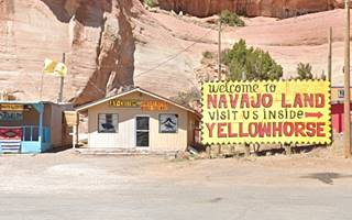 single floor gable roof buiilding on US 66