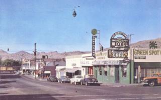 1940s C and 7th streets Victorville CA corner of two streets in the 1940s, cars, cafe, bowling, signs, hills in the distance