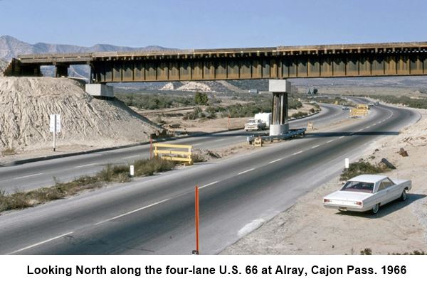 1966 Alray viaduct on US66 in Cajon Pass color, 1966, cars along a 4 lane divided highway, mountains in the distance, they pass under a railroad viaduct