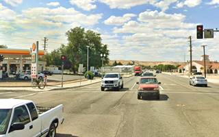 2023: D and 7th streets Victorville CA corner of two streets in the 2023, cars, trees, buildings, gas station, traffic light