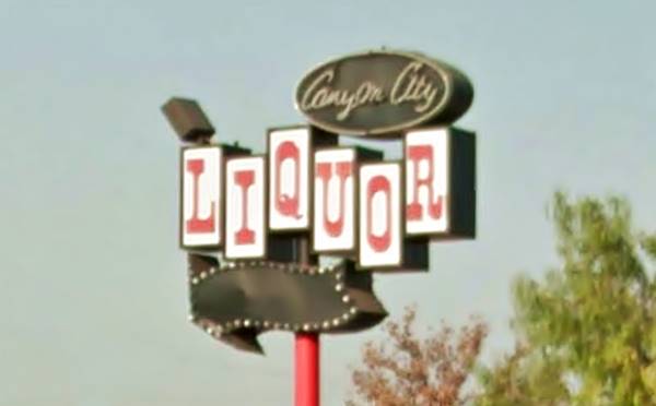 View of a Liquor Store neon sign in Azusa, Route 66, California