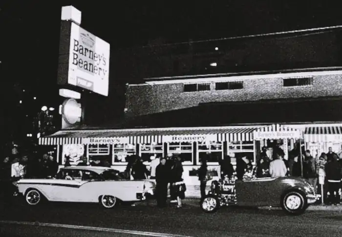 black and white 1950s at night, youngster, hot rods