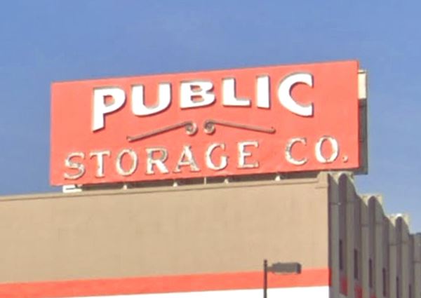 red sigh on a rooftop, white letters reads PUBLIC STORAGE CO