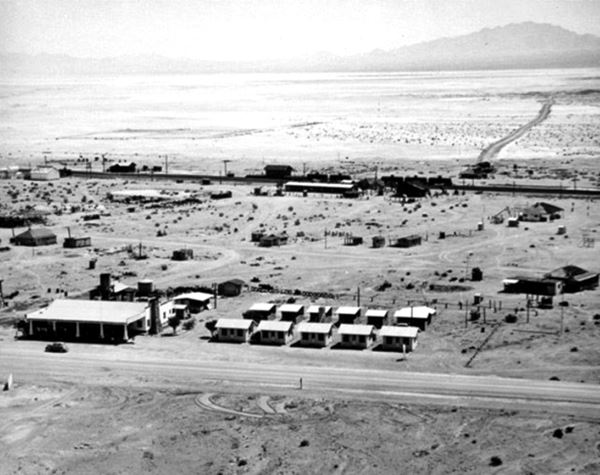aerial view of Benders gas station, camp and Amboy RR station beyond. Black and white c.1940-43 