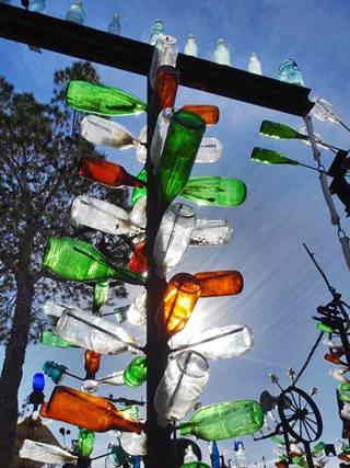 bottle tree steel tree with bottles at the tip of each branch