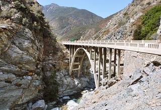 Bridge to Nowhere, Azusa color, concrete bridge. Mountains, steep rocky cliffs