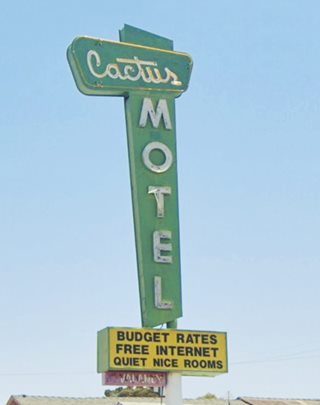 1950s Cactus Motel neon sign green neon sign CACTUS written on the top, horizontally, MOTEL written vertically, yellow panel bottom