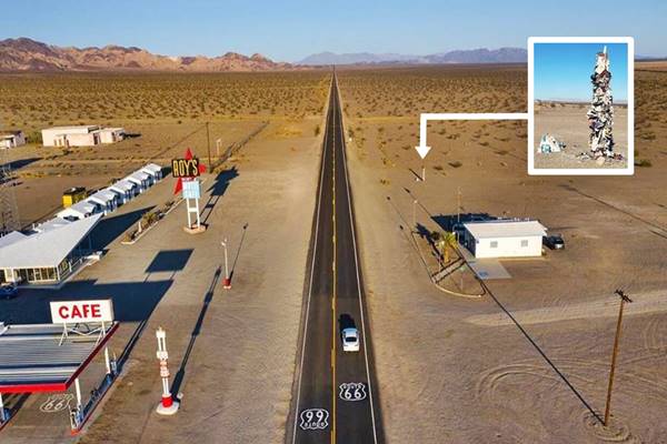 Clothing post 2020, Amboy US 66 aerial view: Roys to the left, post office right, US 66 middle. Clothing post marked with red arrow upper right