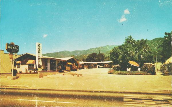 1960s Code of the West postcard, Duarte CA Route 66 color 1960s postcard, motel facing route 66, neon sign to the left