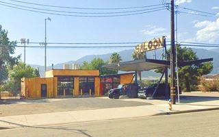 1960s gas station now Screaming Sallys, US 66 Devore butterfly canopy, canting office roof, 2 service bays, old gas station c.1960s now a bar