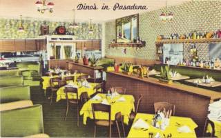 1940s color linnen postcard of interior of a restaurant, booths to the left, green upholstry, tables with yellow table covers, bar on the right