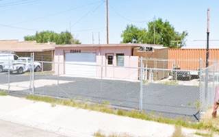 Fargo gas station pink building 1 service bay, office. No canopy or pumps