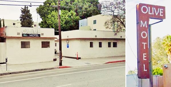 The Olive Motel LA Route 66 single story motel, office left, rounded corner, entrance middle, units right, flat roof. Inset far right with red neon sign white letters inverted L shaped. Says OLIVE across and MOTEL vertically