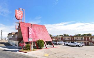 motel with a steep gable red roof