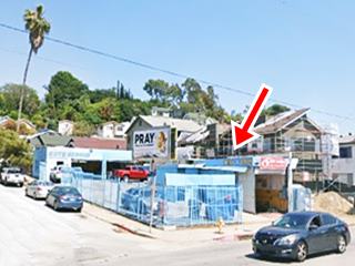 corner former gas station, service bays to the back and left, drive on the corner