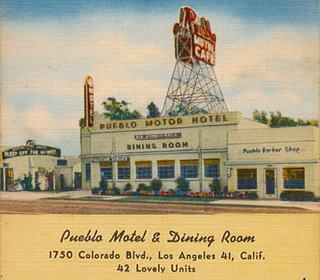 color linnen postcard, two panels. Top: motel dining room box shaped flat building sign on the left, by entrance drive, US66 in front. Bottom: hip roofed cabins, one with chimney