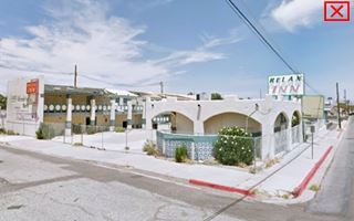 motel, arches and office right by US66, units in 2 floors rear. Whitewashed