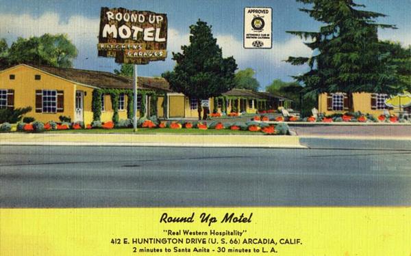 Round Up Motel 1957, Arcadia CA Route 66 1950s linnen postcard, motel, gable roofed, neon sign, trees, ROUND UP MOTEL in text below. Arcadia CA