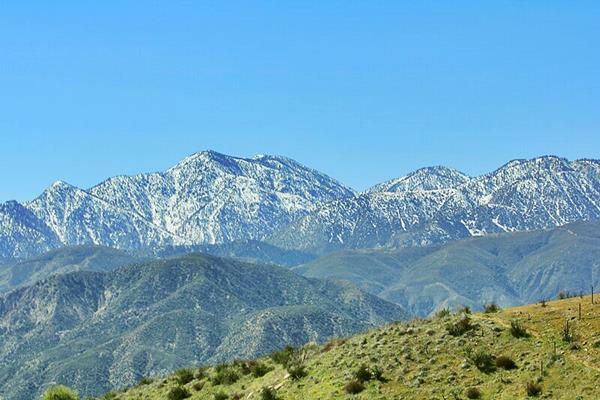 snow capped San Gabriel mountains seen from Route 66 in Cajon Pass
