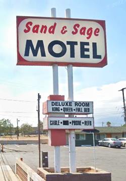 box shaped panels in white with red letters spelling SAND & SAGE and MTEL in blue, two slender poles, 1960s neon sign seen from US66, color, 2023
