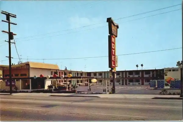 motel building neon sign, 1960s postcard