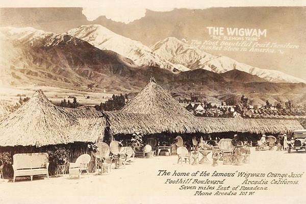 Slemons Tribe Orange Wigwam c.1930 Arcadia CA Route 66 sepia postcard thatched stand with conical roof, mountains beyond, text reads SLEMONS ORANGE STAND, c.1930 Arcadia CA