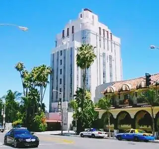 isolated white tower building seen from street