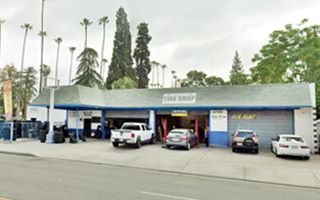 Dennis station nowadays former gas station, canopy, and service bays, mansard roof