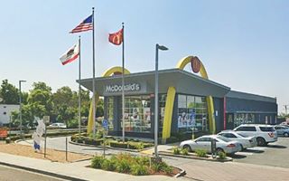 retro styled McDonalds with yellow arches flanking the building