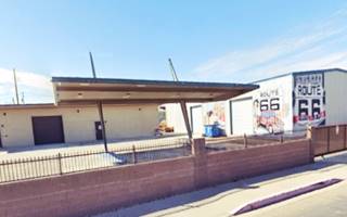 canopy held by steel poles and wires