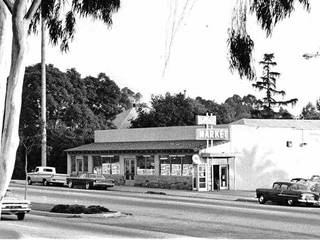 Wolfes Market 1965, US 66 Claremont CA black and white, 1965, a market seen from across Route 66, cars and trees