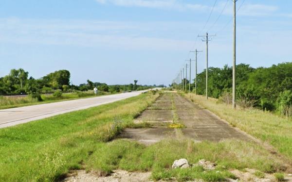 two abandoned lanes (right) next to the current road
