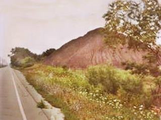 heap of slag by ALT66 in 1999 color, gray cone shaped pile of slag by ALT US 66